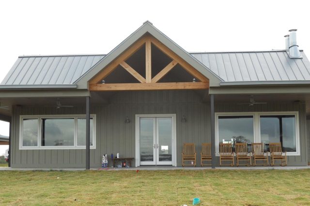 Casita guest home with cedar truss gable and metal roof