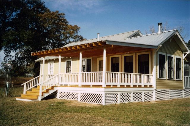 Country farmhouse with a full-width porch addition