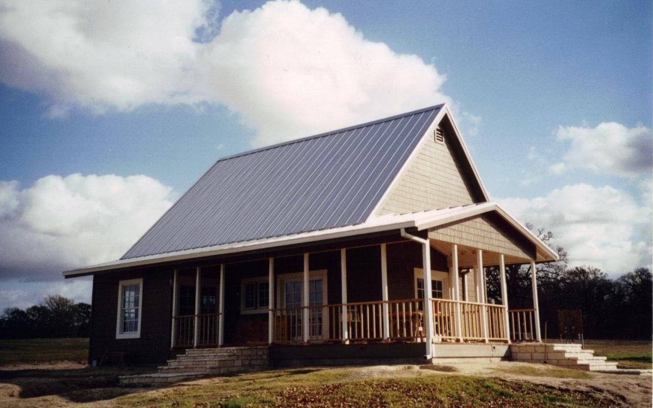 Custom country home with a covered porch built by Cross Creek