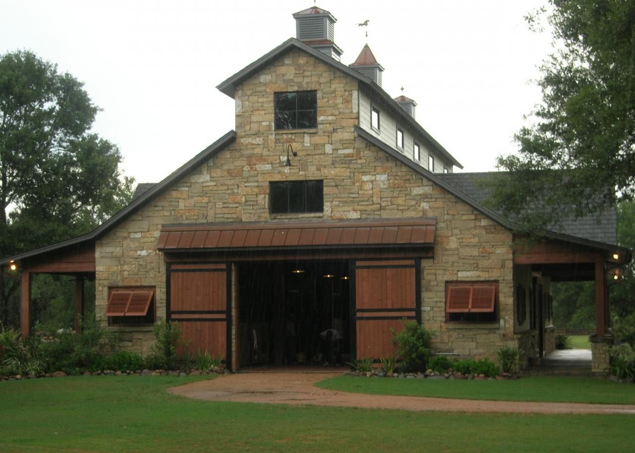 Stone entrance and cupola at Cypress Stable